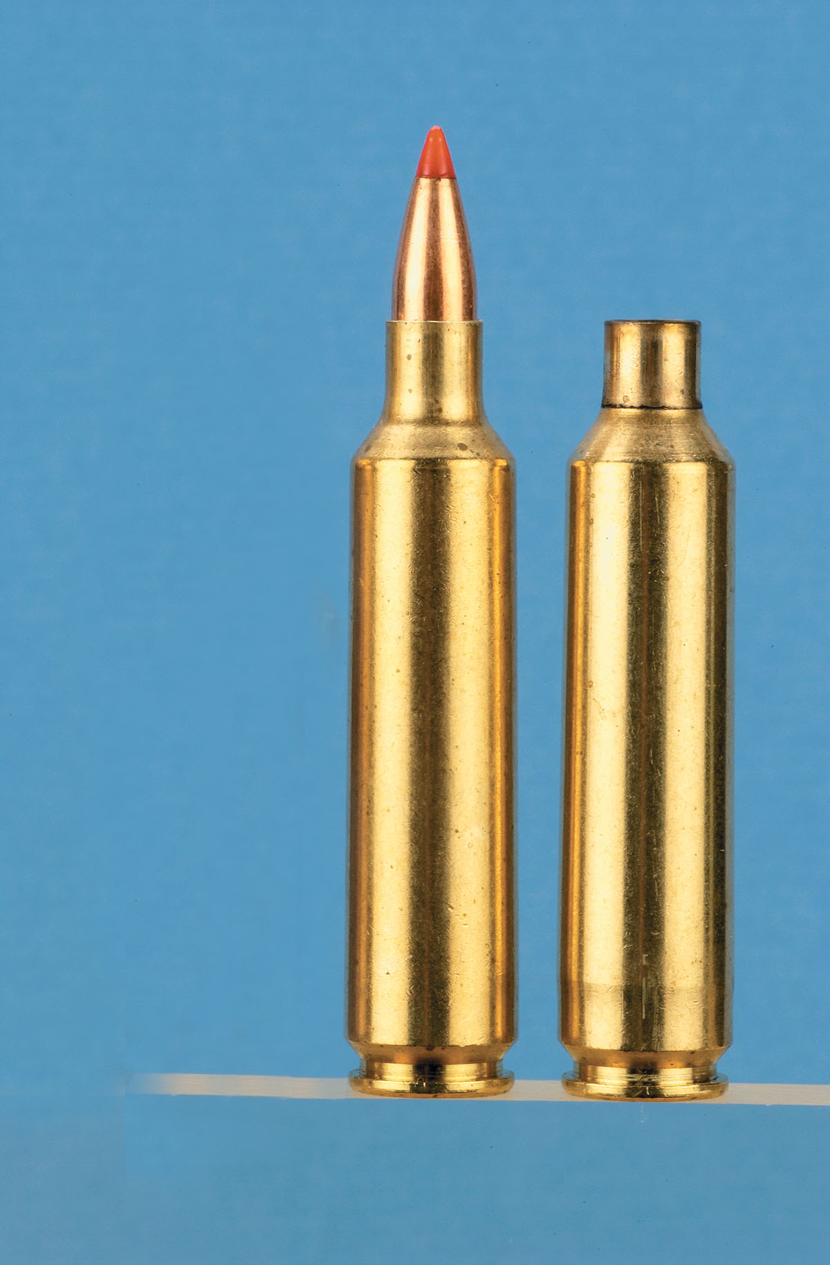 A loaded 6mm-284 and a fired case ready to be neck sized.